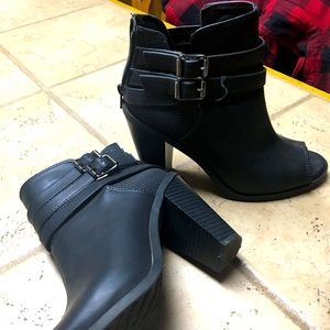 Black peek a boo high heel bootie